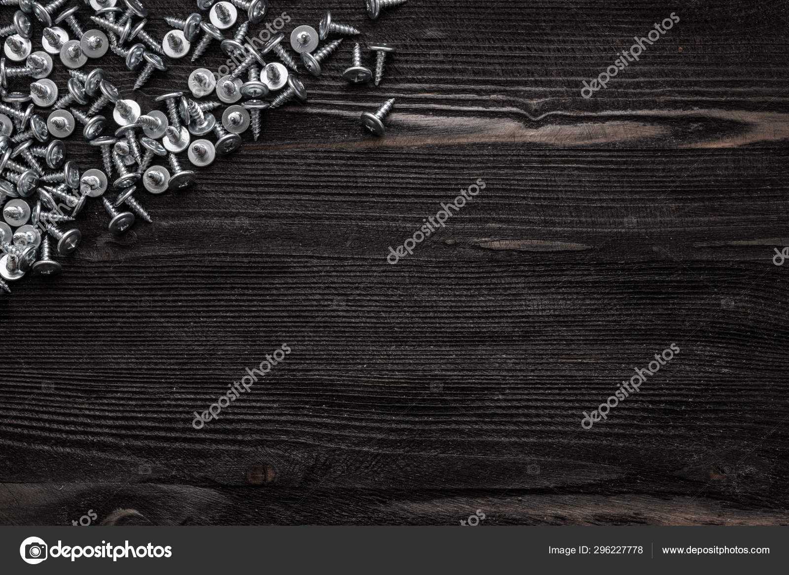 Some Wood Crews On Dark Wooden Desk Board Surface. Top View Regarding Borderless Certificate Templates